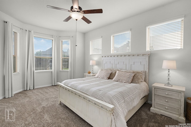 carpeted bedroom featuring ceiling fan