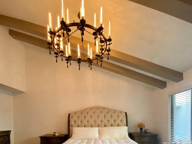 bedroom featuring beam ceiling