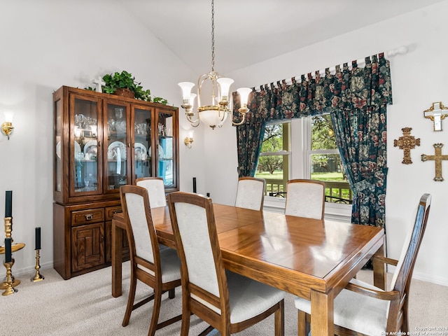 143 Cascade Caverns, Boerne, TX 78015 - dining space with baseboards, light carpet, a notable chandelier, and vaulted ceiling