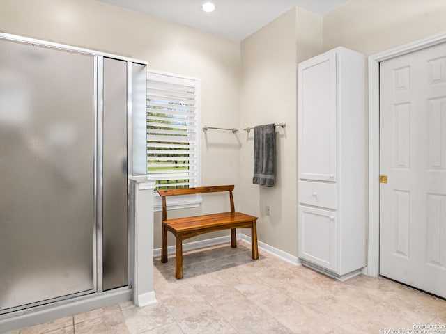 143 Cascade Caverns, Boerne, TX 78015 - bathroom featuring recessed lighting, baseboards, and a shower stall