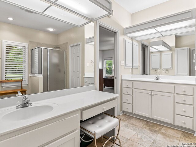 143 Cascade Caverns, Boerne, TX 78015 - bathroom featuring a stall shower and vanity