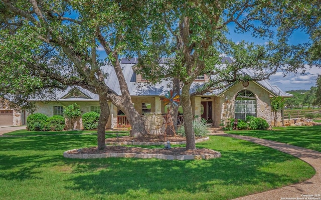 view of front of home with a front yard