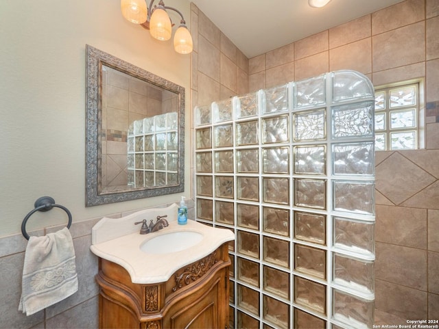 bathroom featuring vanity and walk in shower