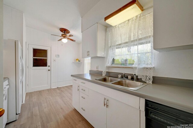 kitchen featuring light hardwood / wood-style flooring, ceiling fan, dishwasher, white cabinetry, and white refrigerator