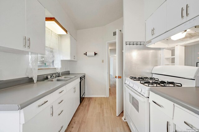 kitchen with white cabinetry, light hardwood / wood-style floors, stainless steel dishwasher, and white gas range oven