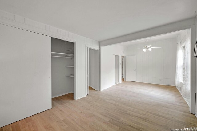 unfurnished bedroom with light wood-type flooring