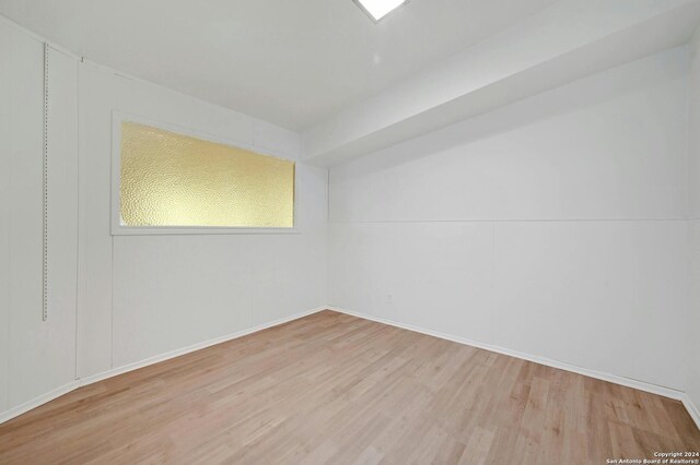 empty room with light wood-type flooring