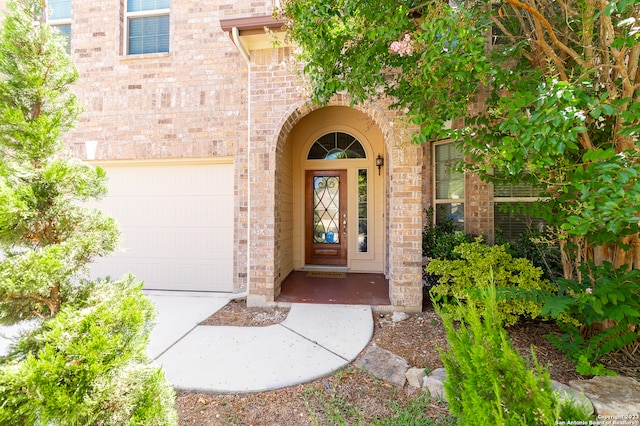 entrance to property featuring a garage