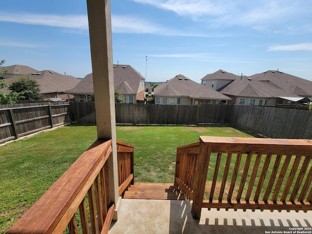 view of yard featuring a wooden deck