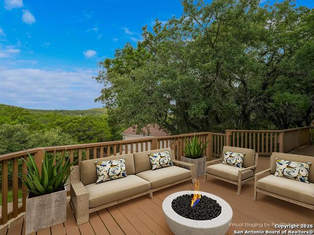 wooden deck featuring outdoor lounge area