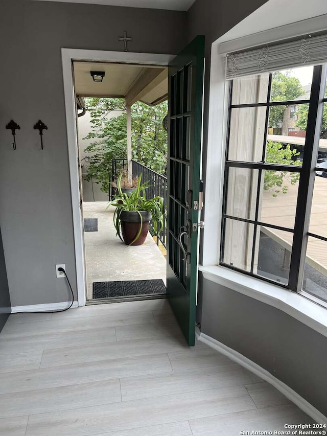 doorway featuring hardwood / wood-style flooring