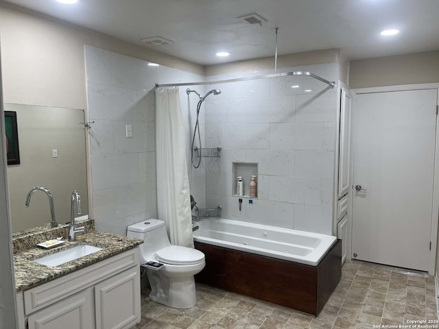 full bathroom featuring vanity, toilet, tile patterned floors, and shower / bath combination with curtain