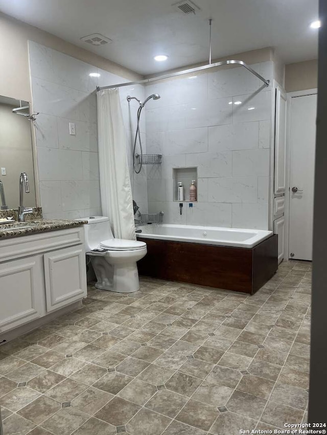 full bathroom with vanity, shower / bath combo, toilet, and tile patterned flooring