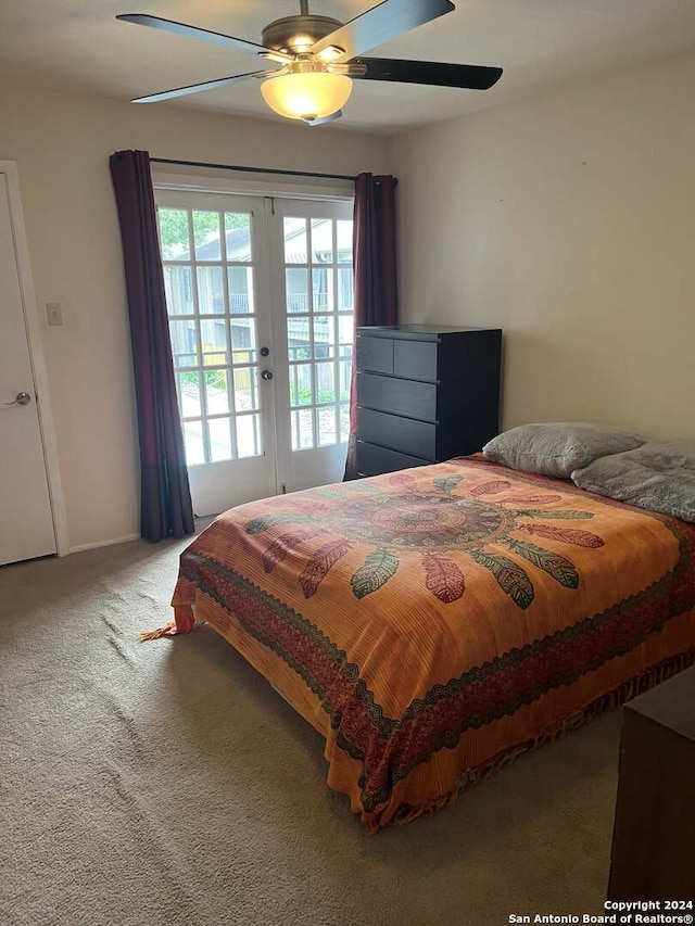 carpeted bedroom featuring ceiling fan, access to outside, and french doors