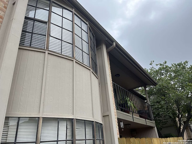 view of property exterior featuring a balcony