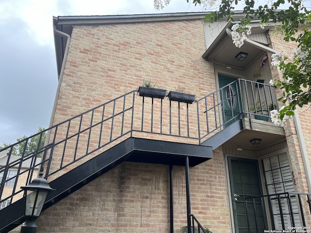 view of home's exterior featuring a balcony