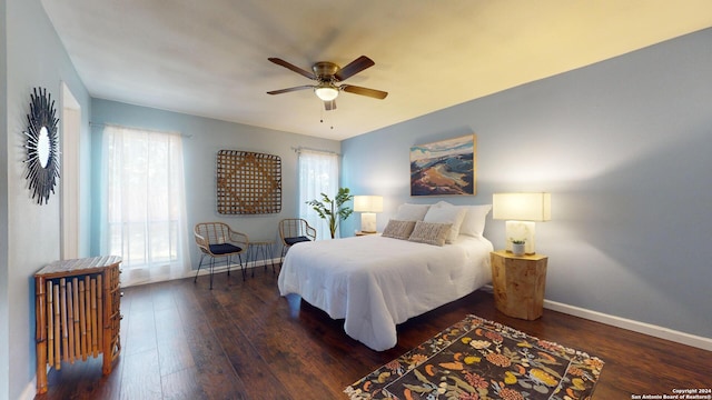 bedroom featuring ceiling fan and dark hardwood / wood-style flooring