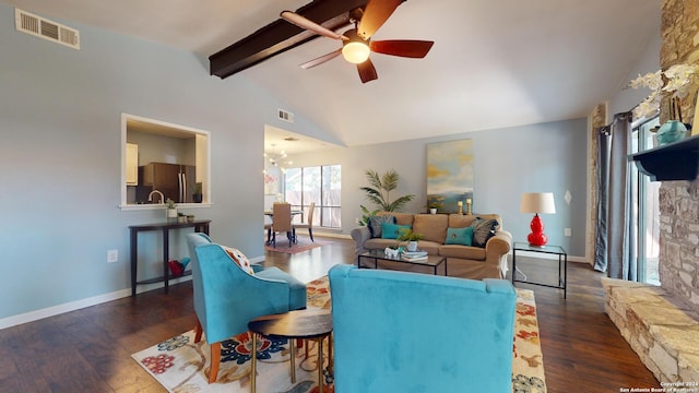 living room with ceiling fan, vaulted ceiling with beams, and dark hardwood / wood-style flooring