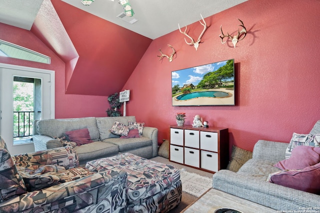 living room with lofted ceiling