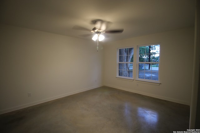 spare room featuring ceiling fan