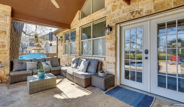 view of patio with french doors and an outdoor hangout area