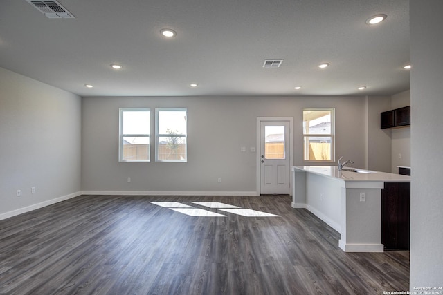 kitchen featuring a healthy amount of sunlight, visible vents, and light countertops