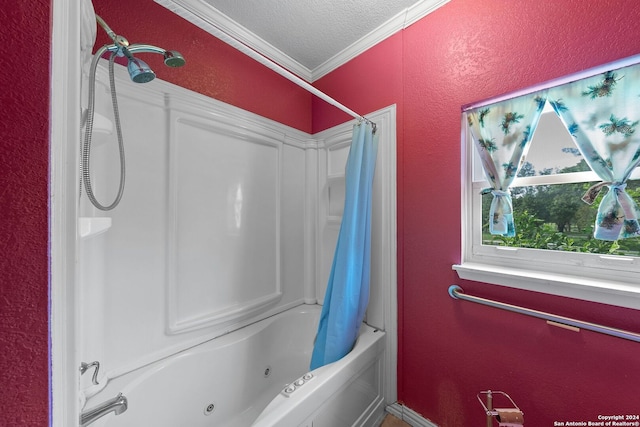 bathroom featuring ornamental molding, a textured ceiling, and shower / tub combo