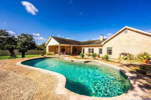 view of swimming pool featuring a patio