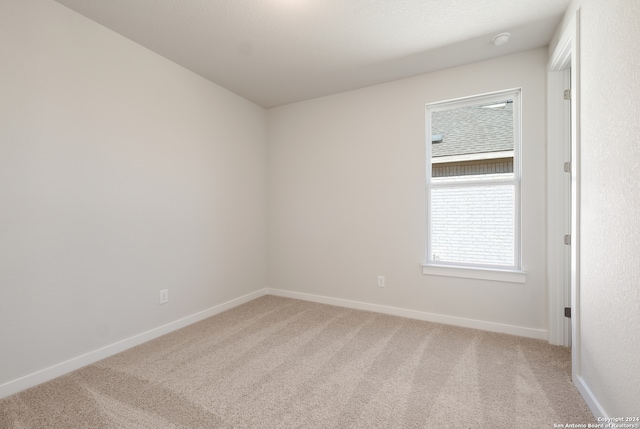 unfurnished room with carpet