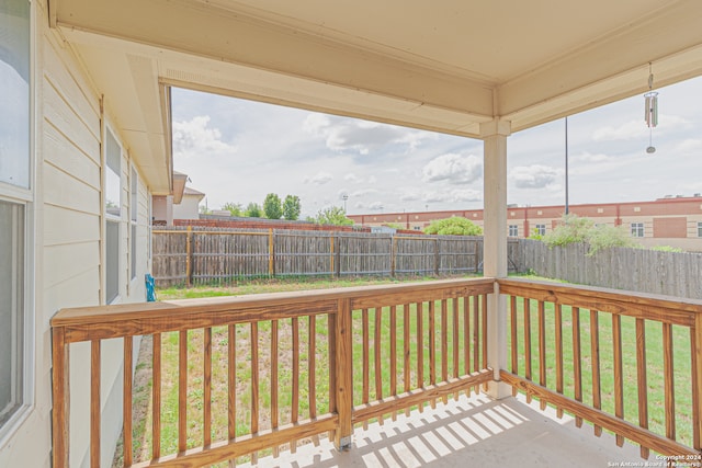 deck featuring a lawn