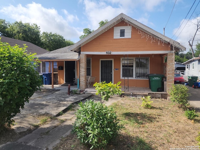 bungalow-style home with a porch