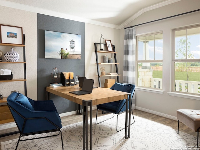 office space with crown molding, vaulted ceiling, and light hardwood / wood-style flooring