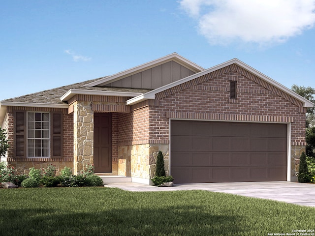 view of front facade with a front yard and a garage