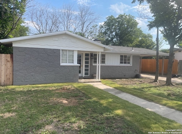 view of front of property with a front lawn