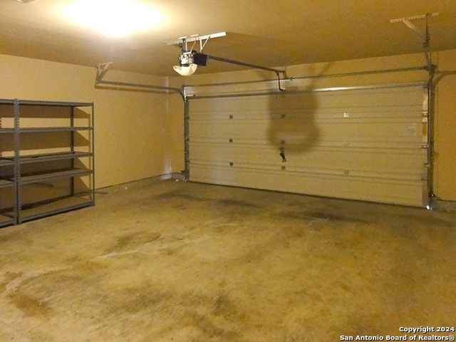 garage with a garage door opener