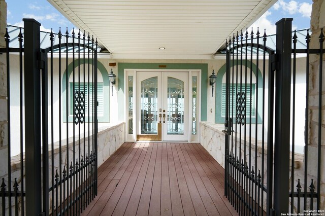 wooden deck with french doors