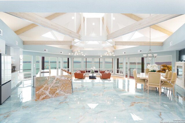 living room with beamed ceiling, high vaulted ceiling, and a chandelier