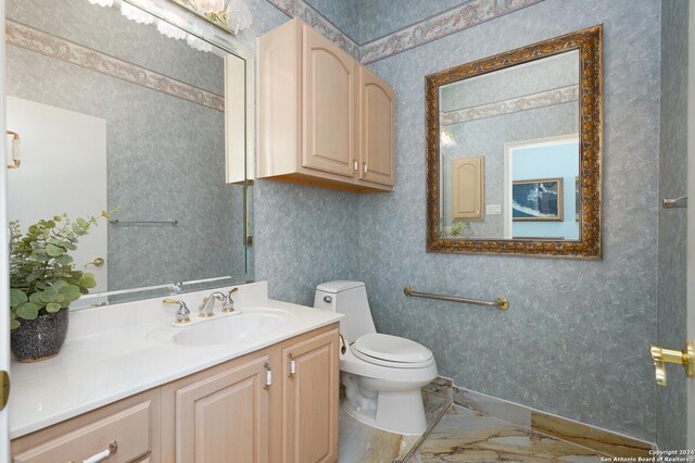 bathroom with tile walls, wood-type flooring, a shower with door, and vanity