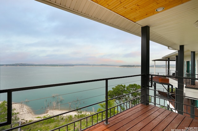 balcony featuring a water view