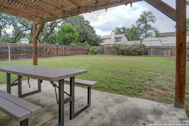 view of yard featuring a patio and a pergola