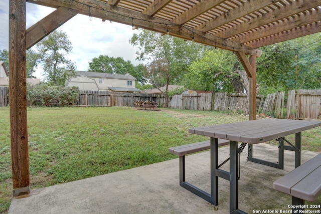 view of yard with a patio area and a pergola