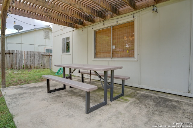 view of patio featuring a pergola