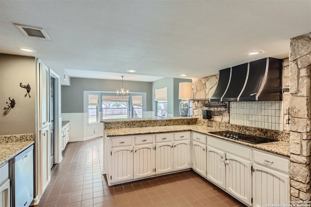 kitchen featuring white cabinetry, black electric stovetop, stainless steel dishwasher, kitchen peninsula, and wall chimney range hood