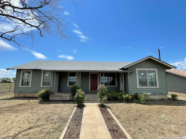 single story home featuring a porch