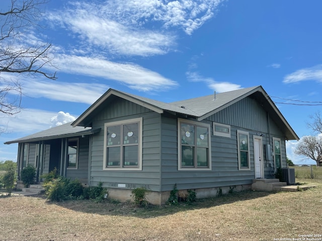 view of property exterior with cooling unit