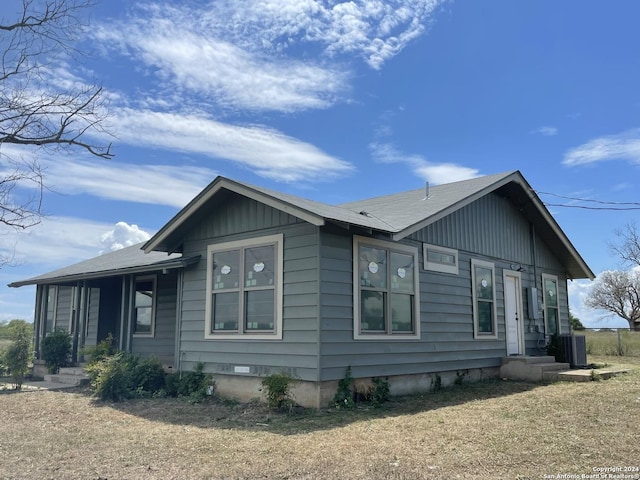 exterior space featuring central AC and crawl space