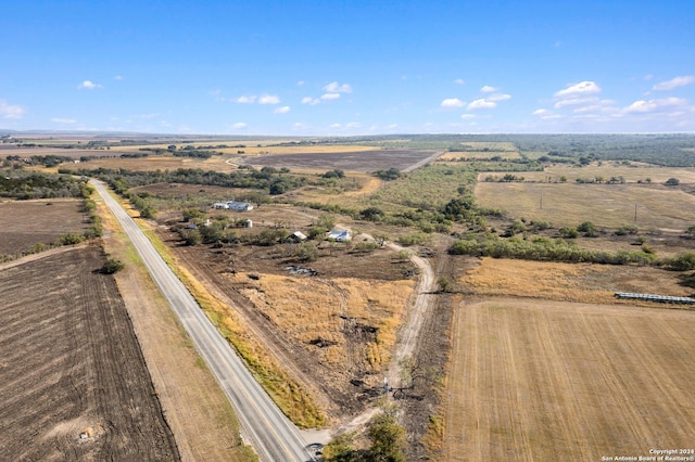birds eye view of property featuring a rural view