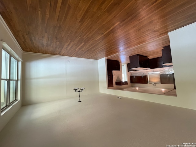 interior space with wood ceiling and ornamental molding