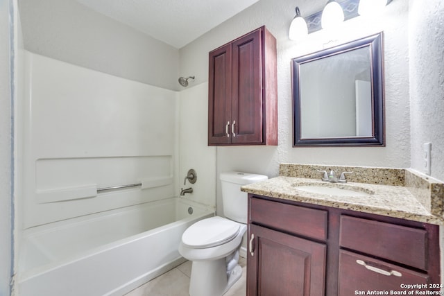 full bathroom featuring tub / shower combination, tile patterned flooring, a textured ceiling, toilet, and vanity