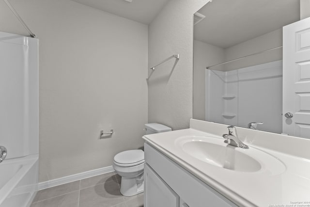 full bathroom featuring tile patterned flooring, vanity, toilet, and shower / washtub combination